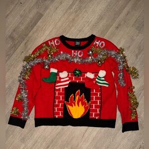 Festive Red Christmas Sweater with Fireplace Design